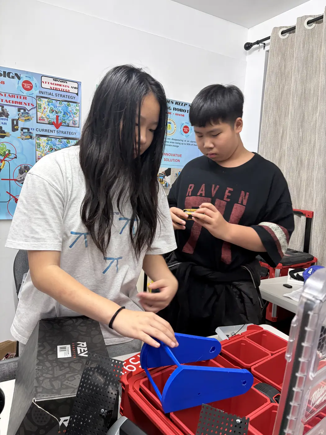 FIRST Tech Challenge robot and students